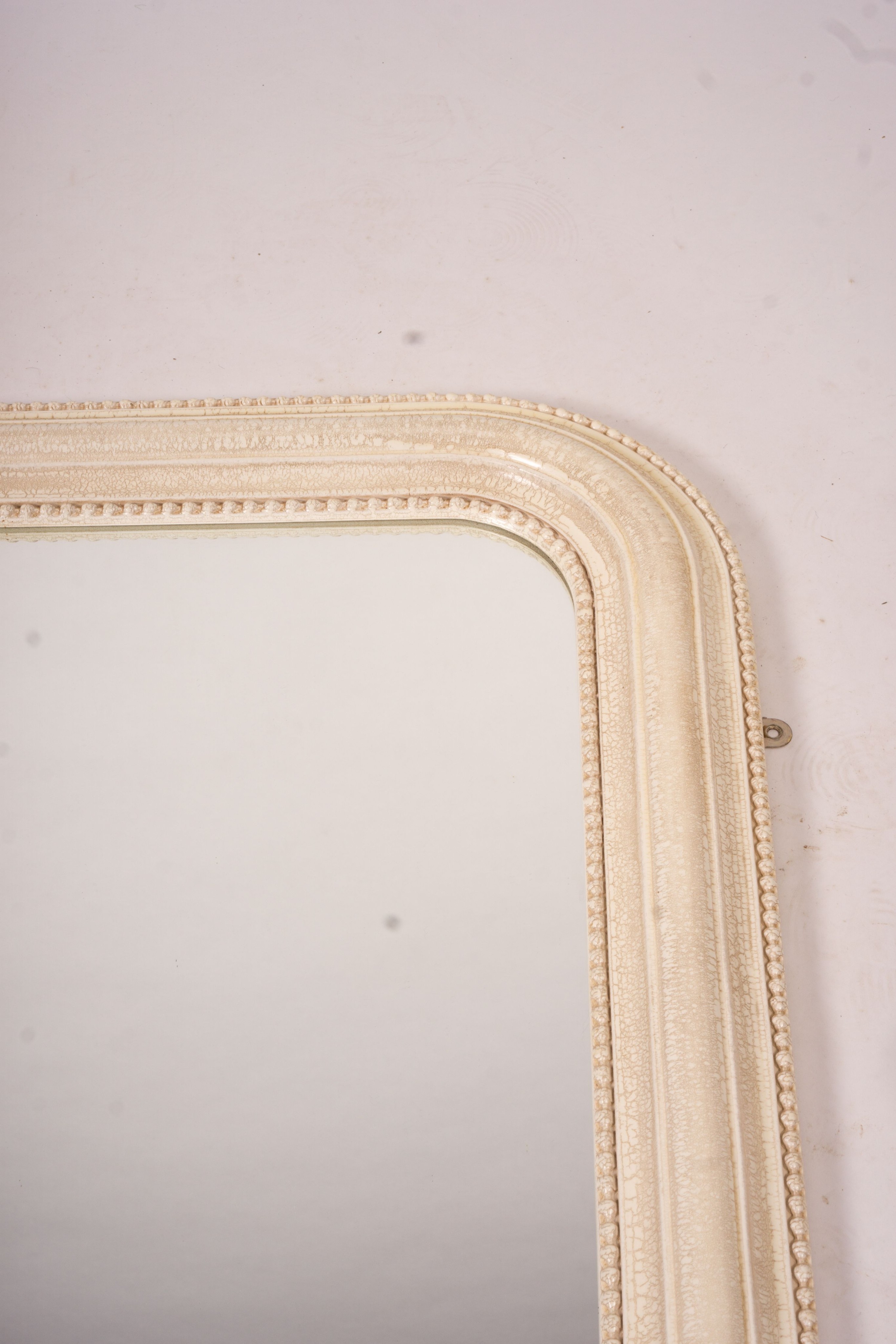 A Laura Ashley overmantel mirror, W.86cm H.110cm